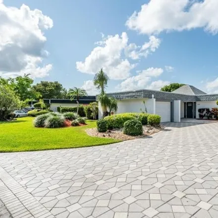 Buy this 3 bed house on 6221 Orchard Tree Lane in Tamarac, FL 33319