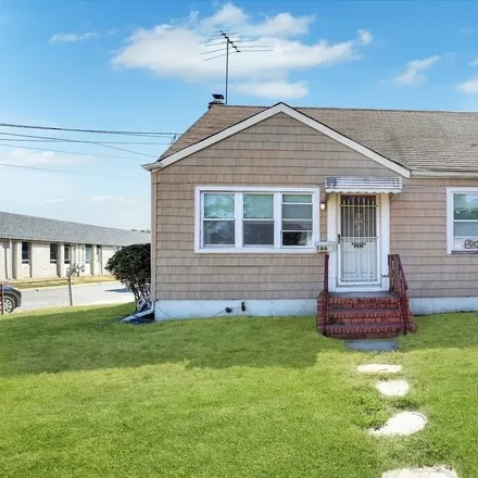 Buy this 4 bed house on 166 South 12th Street in Village of Lindenhurst, NY 11757