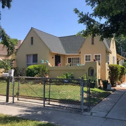 Buy this 3 bed house on 1664 South Burnside Avenue in Los Angeles, CA 90019