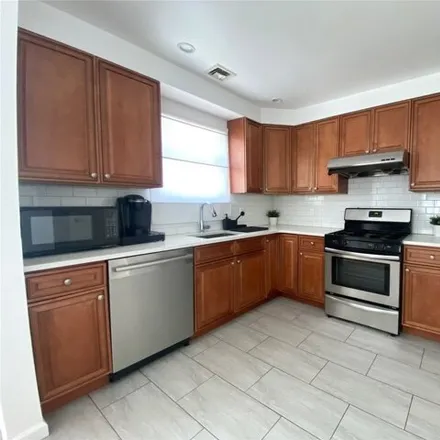 Rent this 3 bed apartment on 8 Martha Terrace in Village of Floral Park, NY 11001