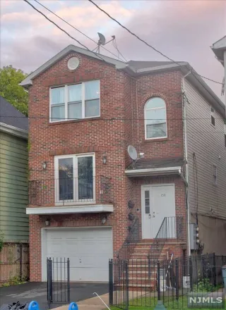 Buy this 7 bed townhouse on 158 Sherman Avenue in Newark, NJ 07114