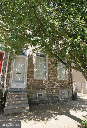 Rent this 3 bed townhouse on 4821 Umbria Street in Philadelphia, PA 19127