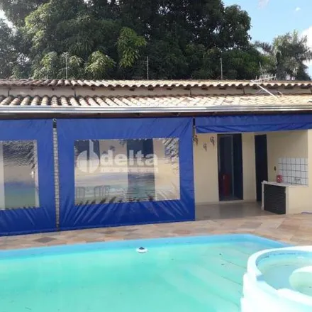Rent this 4 bed house on Rua Natalina de Castro Pereira in Presidente Roosevelt, Uberlândia - MG