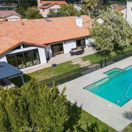 Rent this 4 bed house on Rancho De Caballeros Bridle Path in Los Angeles, CA 91311