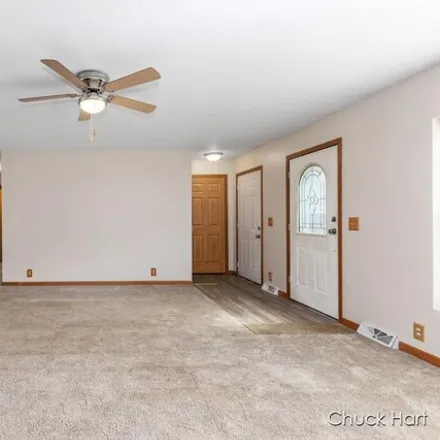 Image 7 - 16221 Wildwood Valley Drive, Solon Township, MI 49319, USA - House for sale