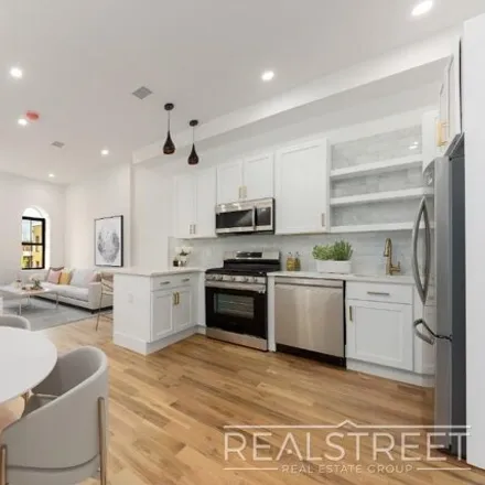 Rent this 4 bed townhouse on 310 Linden Street in New York, NY 11237