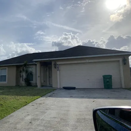 Rent this 3 bed house on 4250 Southwest Yalta Street in Port Saint Lucie, FL 34953