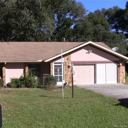 Rent this 3 bed house on 1238 East Silver Thorn Loop in Holder, Citrus County