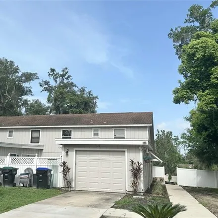 Rent this 3 bed townhouse on 122 S Bulova Dr in Apopka, Florida