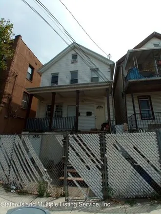 Buy this 3 bed house on 40 Tompkins Street in New York, NY 10304