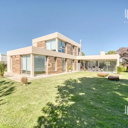 Buy this 5 bed house on unnamed road in Bosque de Peralta Ramos, B7603 DRT Mar del Plata