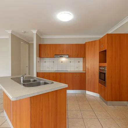 Rent this 4 bed apartment on 10 Tambo Court in Mount Louisa QLD 4814, Australia