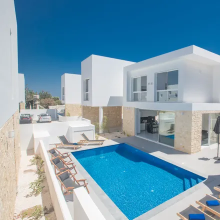 Rent this 4 bed house on Blue Island Villa in Efkleidou, 5296 Protaras