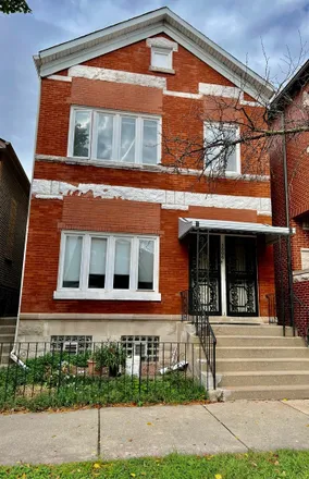 Rent this 4 bed house on 3002 South Normal Avenue in Chicago, IL 60609