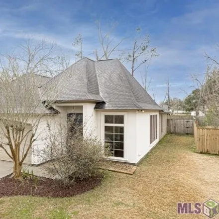 Rent this 3 bed house on 8856 Magnalia Loof Avenue in Laurel Lea, Baton Rouge