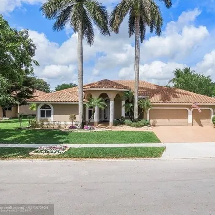 Rent this 4 bed house on 6689 Northwest 70th Place in Parkland, FL 33067