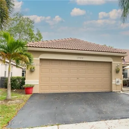 Rent this 3 bed house on 1997 Pisces Terrace in Weston, FL 33327
