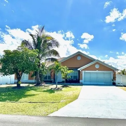 Rent this 4 bed house on 1392 Se Odonnell Ln in Port Saint Lucie, Florida