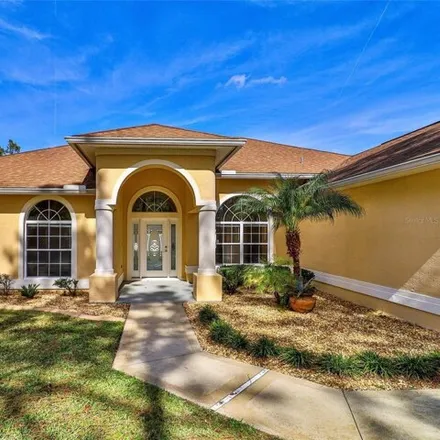 Buy this 4 bed house on 98 Wainshire Place in Palm Coast, FL 32164