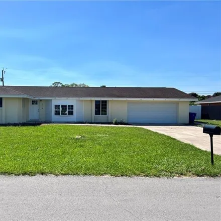 Rent this 3 bed house on 354 Inman Street in Lehigh Acres, FL 33936