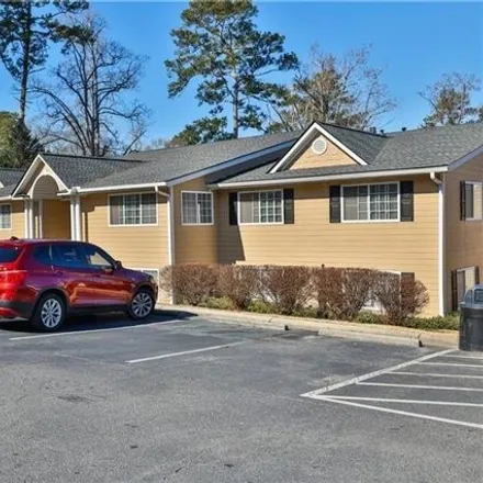 Rent this 2 bed condo on 1000 Regency Woods Drive in Brookhaven, GA 30319