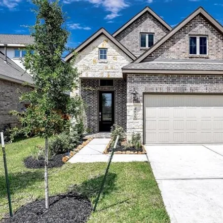 Rent this 4 bed house on 4935 Sand Clouds Dr in Katy, Texas