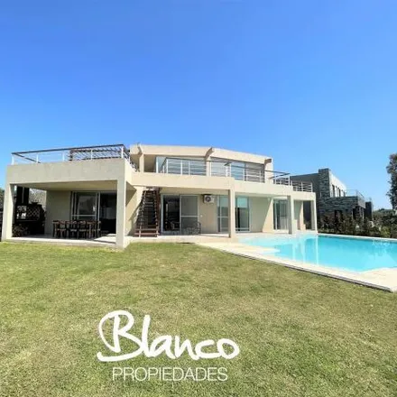 Rent this 4 bed house on unnamed road in Haras Santa María, 1628 Loma Verde