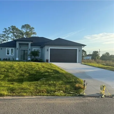 Buy this 3 bed house on 3254 4th Street Southwest in Lehigh Acres, FL 33976