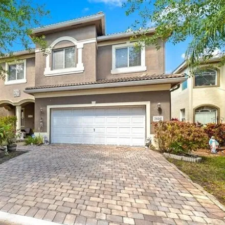 Rent this 5 bed house on 1575 Sage Wood Court in Riviera Beach, FL 33404