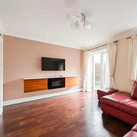 Rent this 3 bed townhouse on Goldfinger Court in 23 Balladier Walk, Bromley-by-Bow
