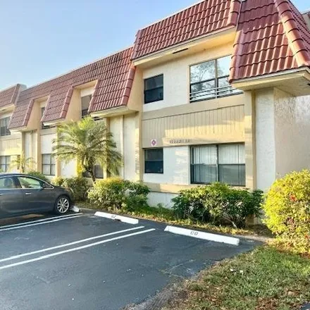 Rent this 2 bed condo on 11112 Royal Palm Boulevard