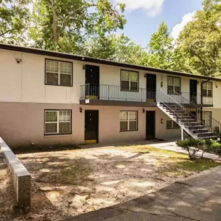 Rent this 2 bed apartment on 6118 Austell avenue