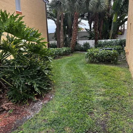 Rent this 2 bed apartment on 1010 Coral Club Drive in Coral Springs, FL 33071