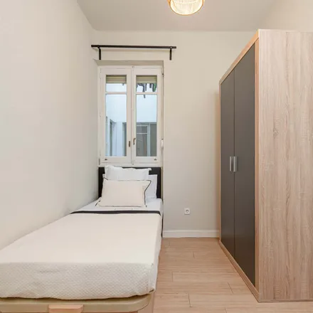 Rent this 7 bed room on Madrid in Marco Aldani, Calle de Martín de los Heros