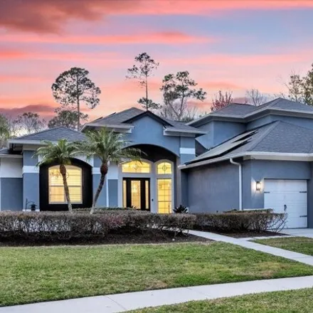 Buy this 5 bed house on 5570 Whispering Woods Point in Seminole County, FL 32771
