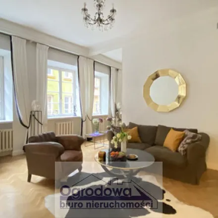 Rent this 3 bed apartment on Piwna 20/26 in 00-265 Warsaw, Poland