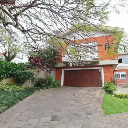 Buy this 5 bed house on Rua Luiz Woelcker 571 in Três Figueiras, Porto Alegre - RS