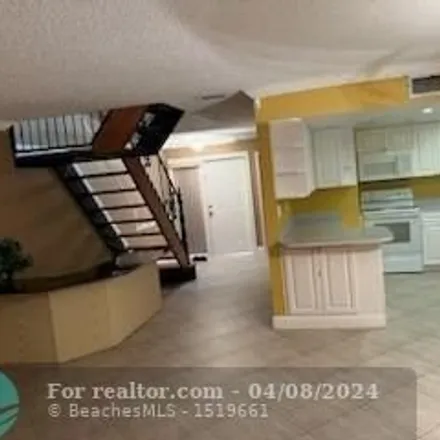 Rent this 3 bed townhouse on 1232 Twin Lakes Drive in Coral Springs, FL 33071
