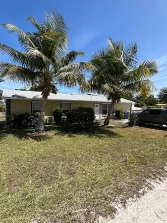 Buy this 4 bed house on 1285 13th Avenue Southwest in Florida Ridge, FL 32962