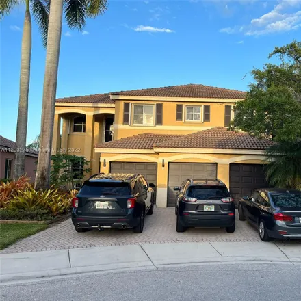 Buy this 5 bed house on 880 Sunflower Circle in Weston, FL 33327