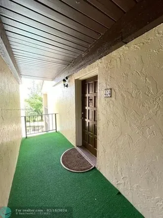 Buy this 2 bed condo on 6060 S Falls Circle Dr Apt 404 in Lauderhill, Florida