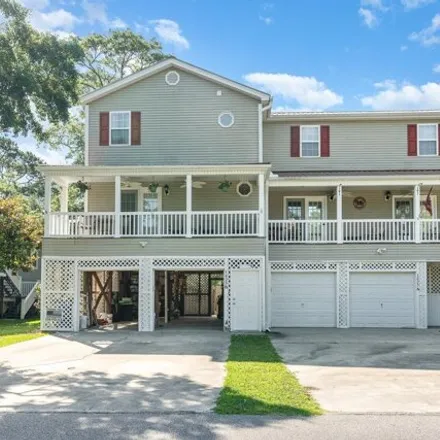 Buy this 2 bed house on 1025 South Lakeside Drive in Surfside Beach, Horry County