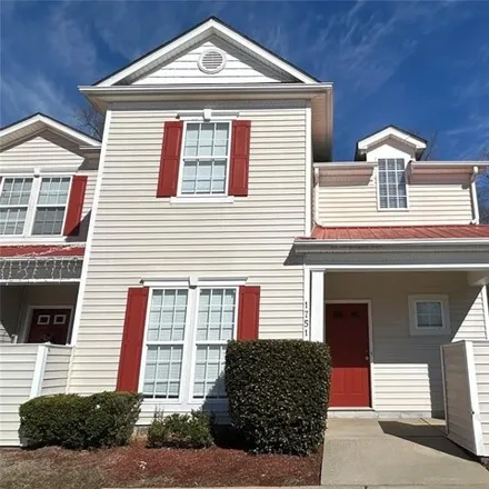 Rent this 3 bed townhouse on 1751 Holliford Court in Charlotte, NC 28215