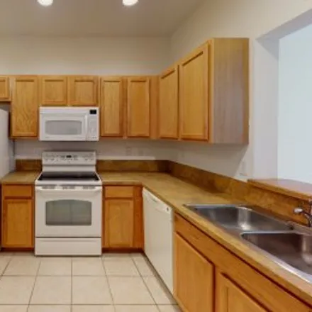 Rent this 3 bed apartment on 4026 Cherrybrook Loop in San Simeon, Fort Myers