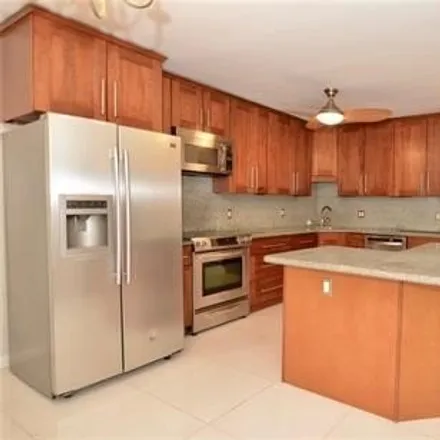 Rent this 3 bed condo on Bowlero in 1501 South Lemon Street, Fullerton