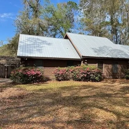 Rent this 4 bed house on 3498 Northwest 49th Terrace in Alachua County, FL 32606