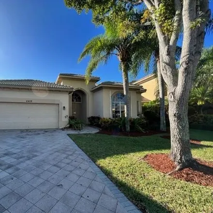 Buy this 4 bed house on 6428 Garden Court in West Palm Beach, FL 33411