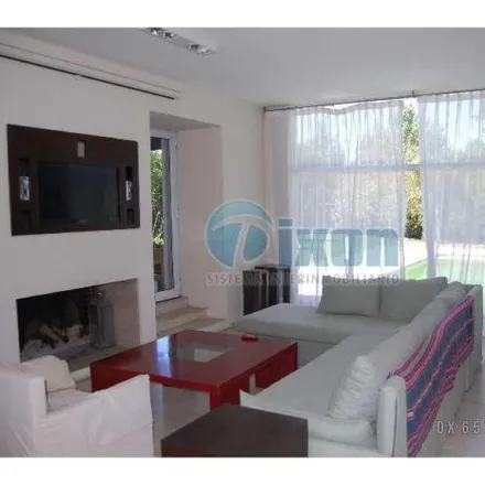 Rent this 4 bed house on unnamed road in Partido de Tigre, 1617 Troncos del Talar