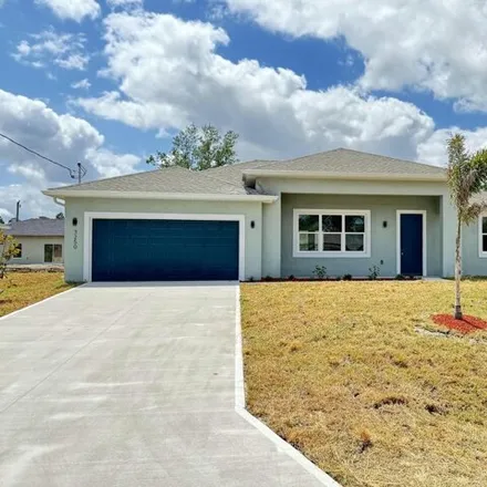 Buy this 4 bed house on 3244 Aspen Road Southeast in Palm Bay, FL 32909
