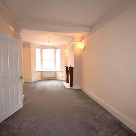 Rent this 4 bed townhouse on Muj's Fade House in 52 Lea Road, Northampton